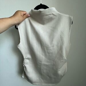Truth Cream Sleeveless Blouse